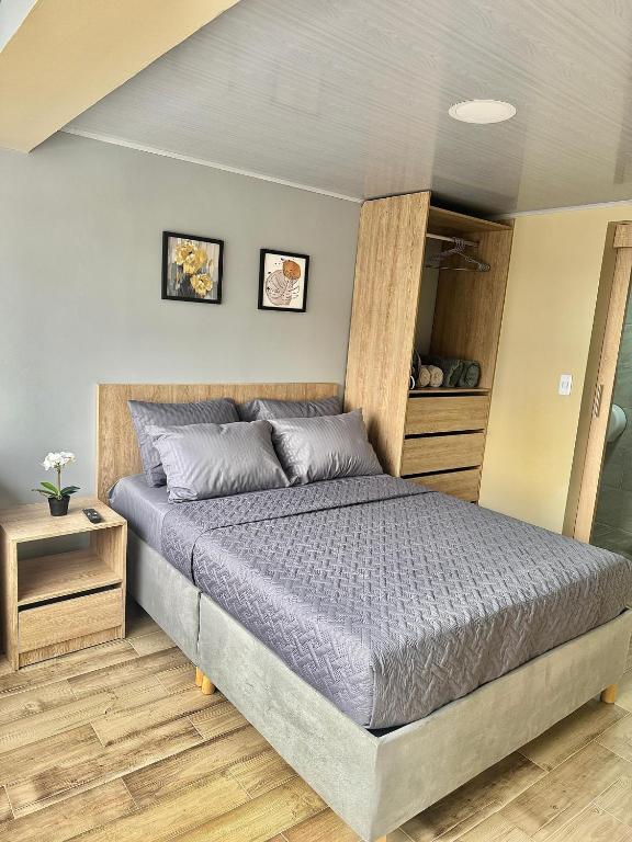 Postel nebo postele na pokoji v ubytování Hostelfc Santa Barbara