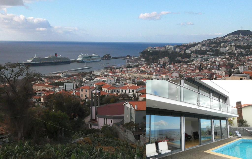 a view of the ocean from a house at Villa Boa Vista in Funchal