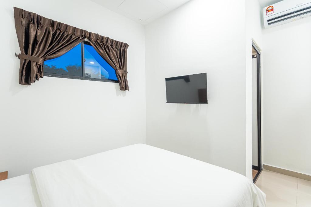 TV a/nebo společenská místnost v ubytování TKT Guesthouse