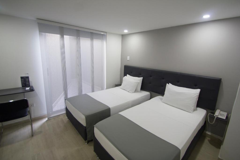 Postel nebo postele na pokoji v ubytování Element Hotel