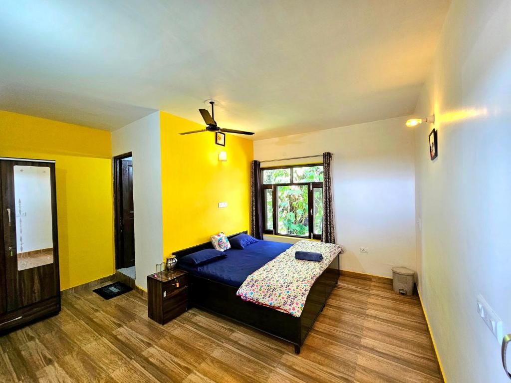 Postel nebo postele na pokoji v ubytování Dadi Homestay 360 Mountain View