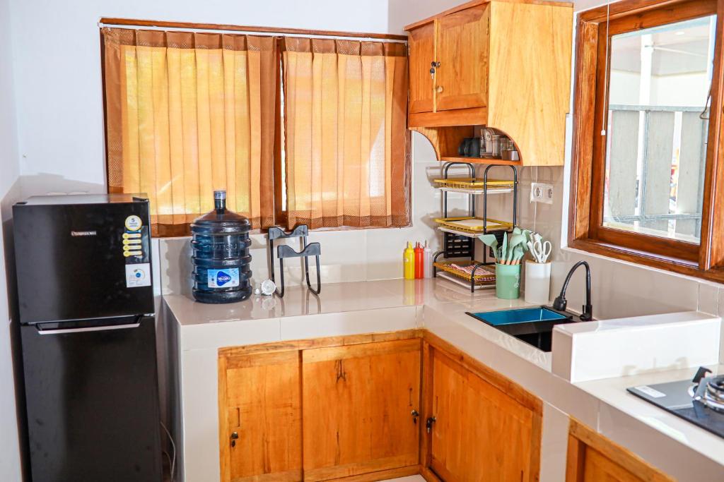 Kuchyň nebo kuchyňský kout v ubytování Trytan Gerupuk Homestay