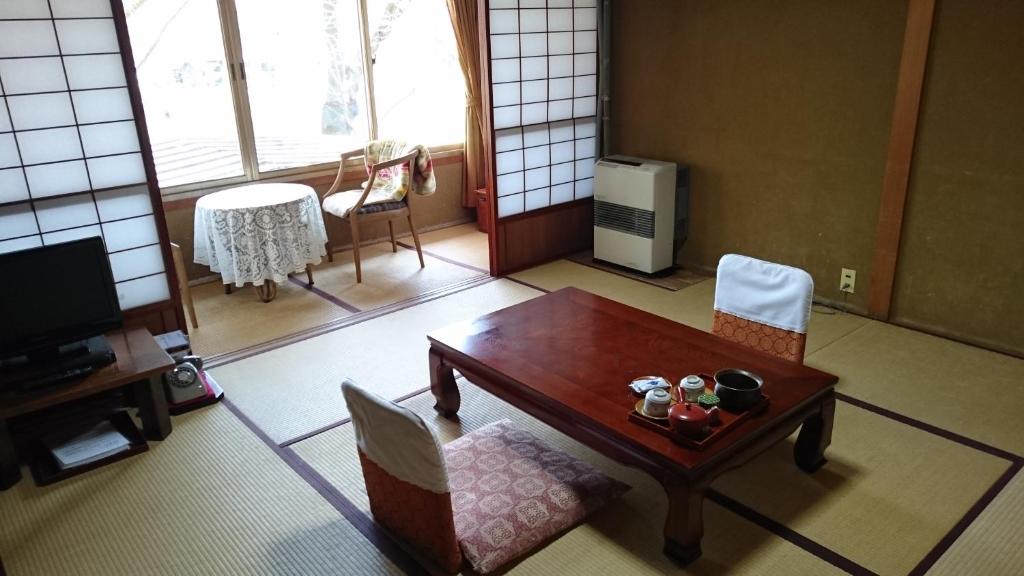 Zona d'estar a Sumiyoshi Ryokan