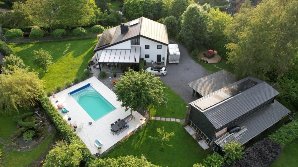 Bazén v ubytování L'écurie gîte duplex Welness nebo v jeho okolí