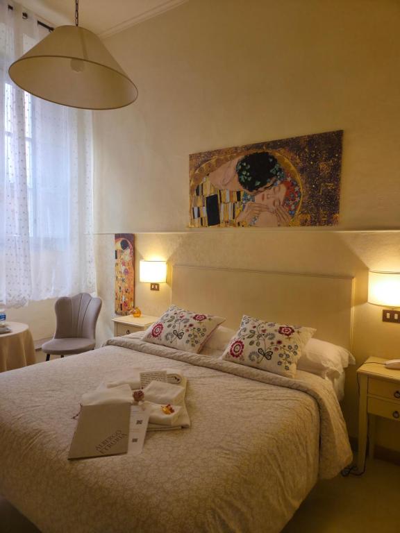 Postel nebo postele na pokoji v ubytování Albergo Etruria