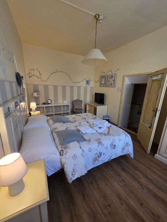 Postel nebo postele na pokoji v ubytování Albergo Etruria