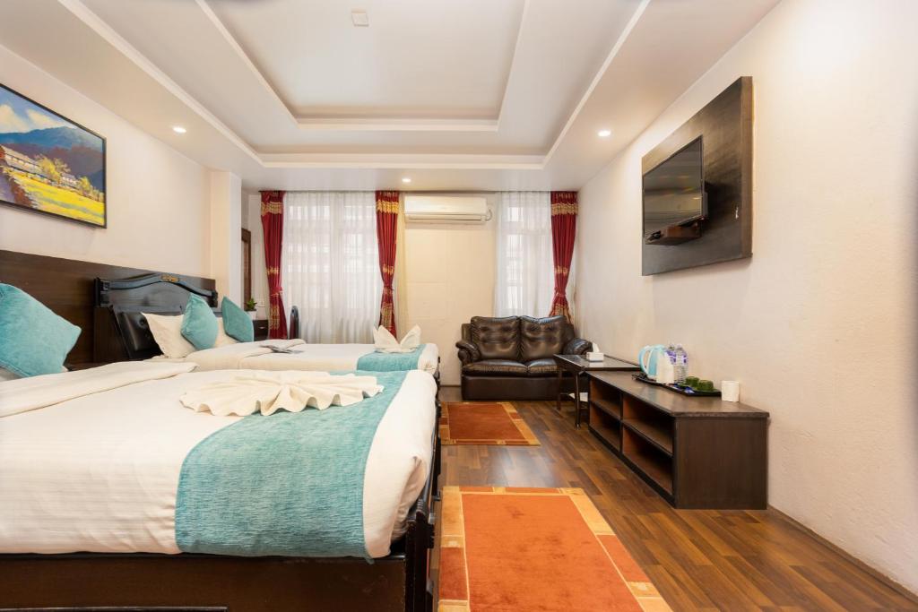 Cama o camas de una habitación en Greatwall International Hotel