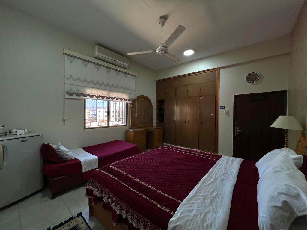 Postel nebo postele na pokoji v ubytování Al-Amer Hostel