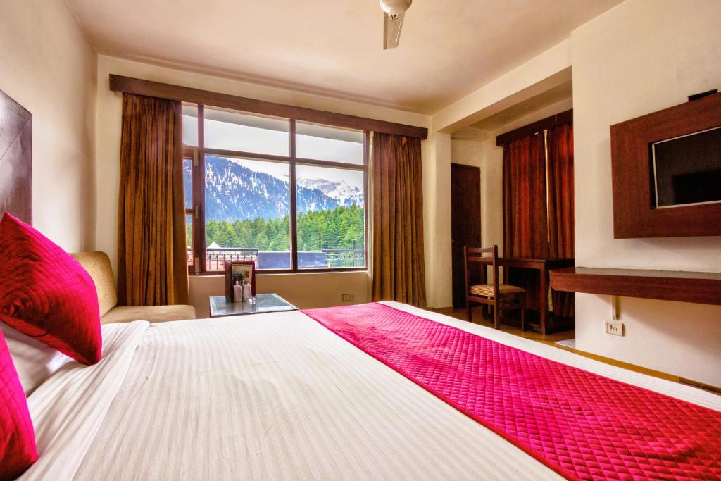 Postel nebo postele na pokoji v ubytování Hotel Greenfields