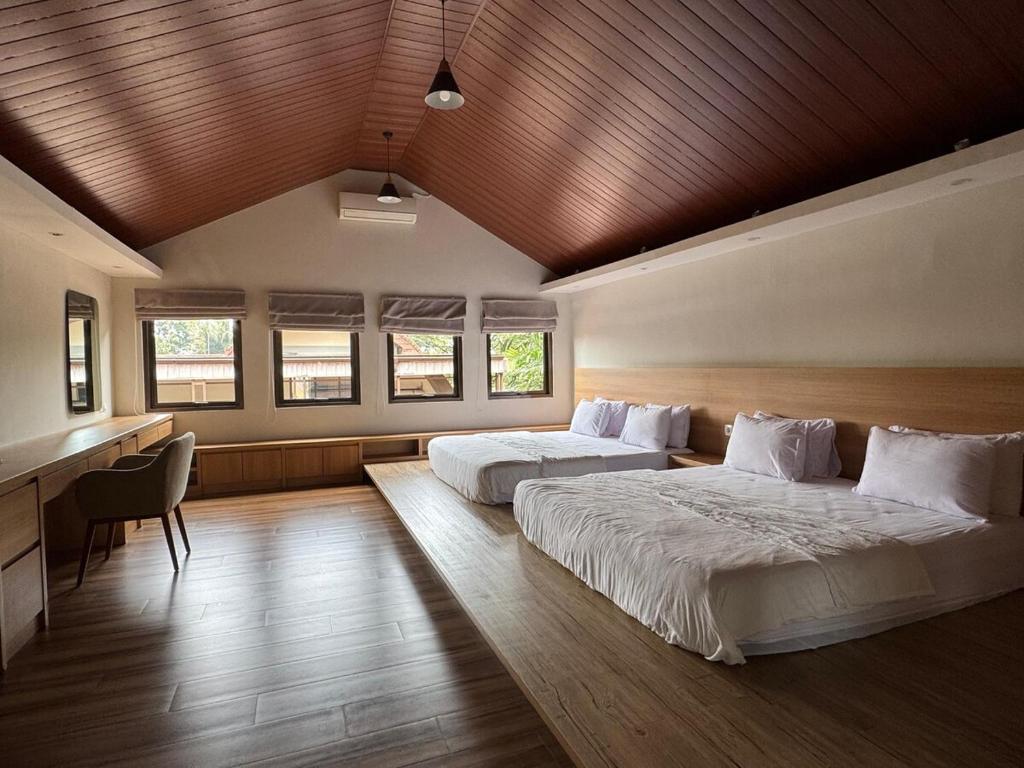 Ένα ή περισσότερα κρεβάτια σε δωμάτιο στο Villa Verde by Terra Homes