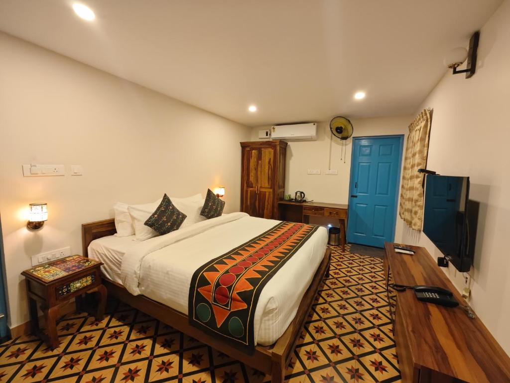 Postel nebo postele na pokoji v ubytování Ibex Resorts, Coimbatore Kakarla