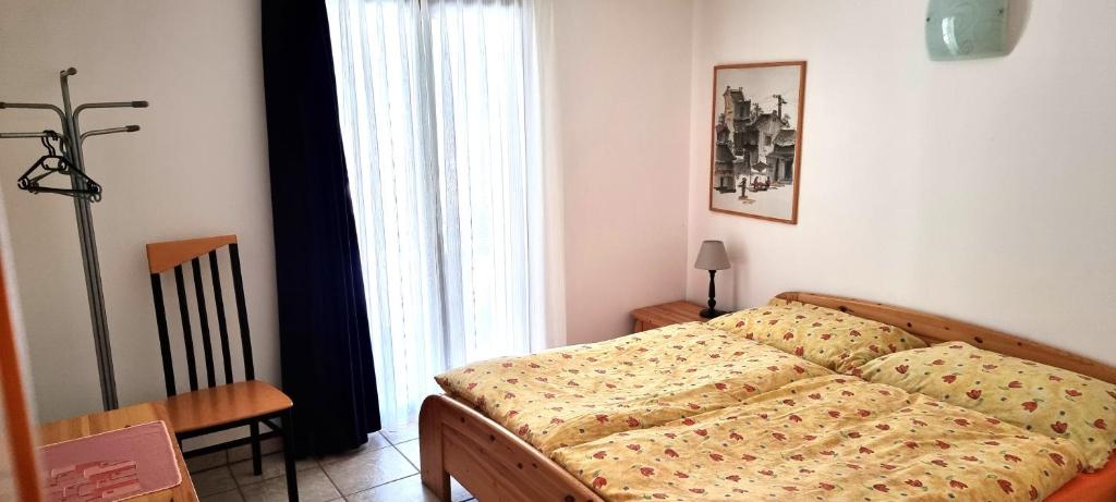Postel nebo postele na pokoji v ubytování Casa Fontanella