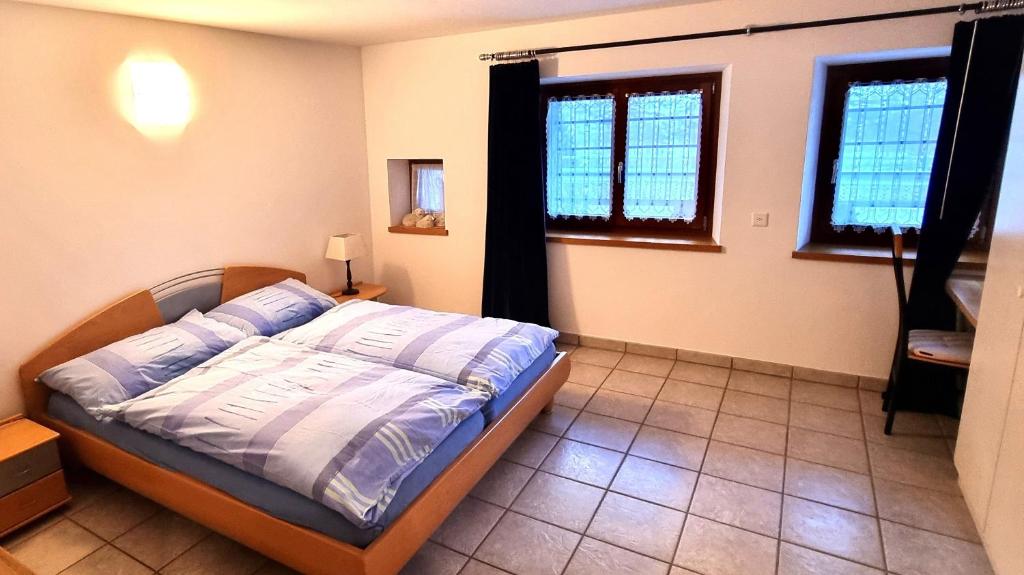 Postel nebo postele na pokoji v ubytování Casa Fontanella