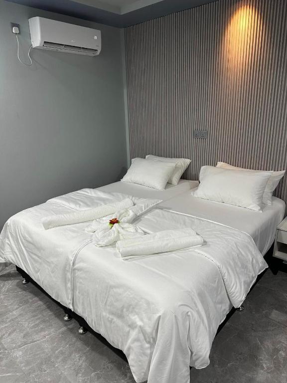 Postel nebo postele na pokoji v ubytování Jazz guest house