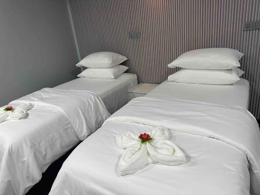 Postel nebo postele na pokoji v ubytování Jazz guest house