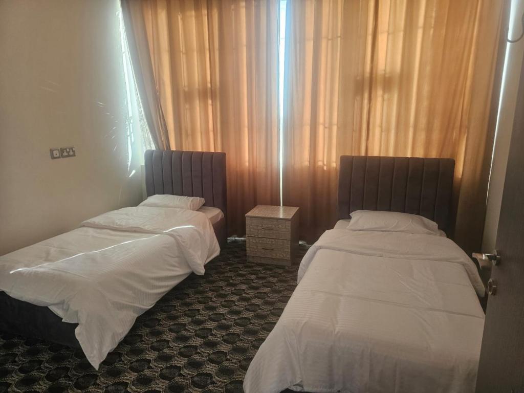 Postel nebo postele na pokoji v ubytování alreaambreather2