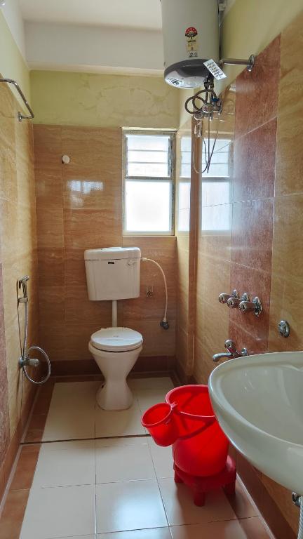 Koupelna v ubytování HOTEL NILADRII GALAXY
