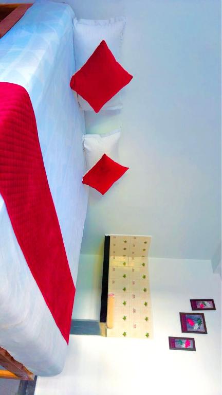 Postel nebo postele na pokoji v ubytování Deepti Guest House