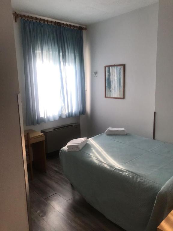 Postel nebo postele na pokoji v ubytování Odec Hotel