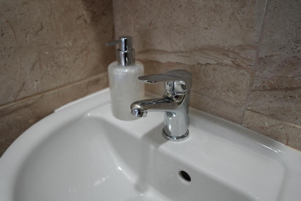A bathroom at Center Hostel and Guest House
