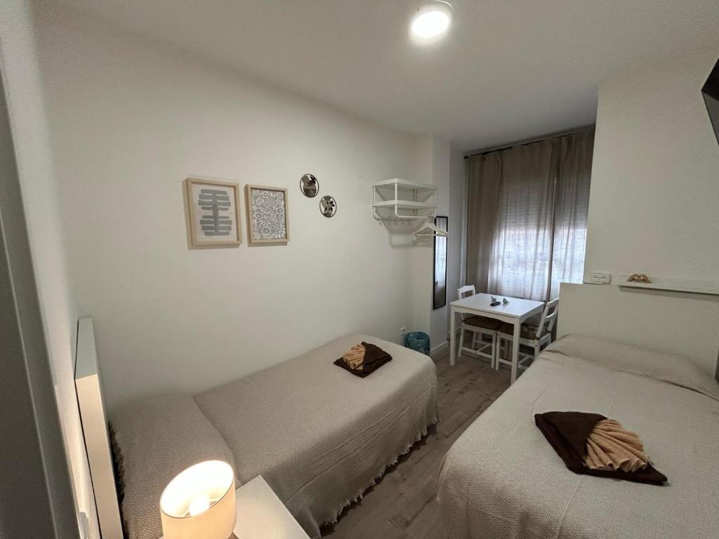 Habitaciones en Embajadores - Resim 9