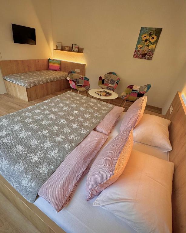 Postel nebo postele na pokoji v ubytování Apartmány Bašta & Wellness