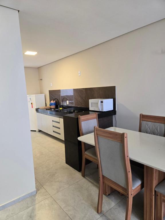 Kuchyň nebo kuchyňský kout v ubytování Residencial Amora