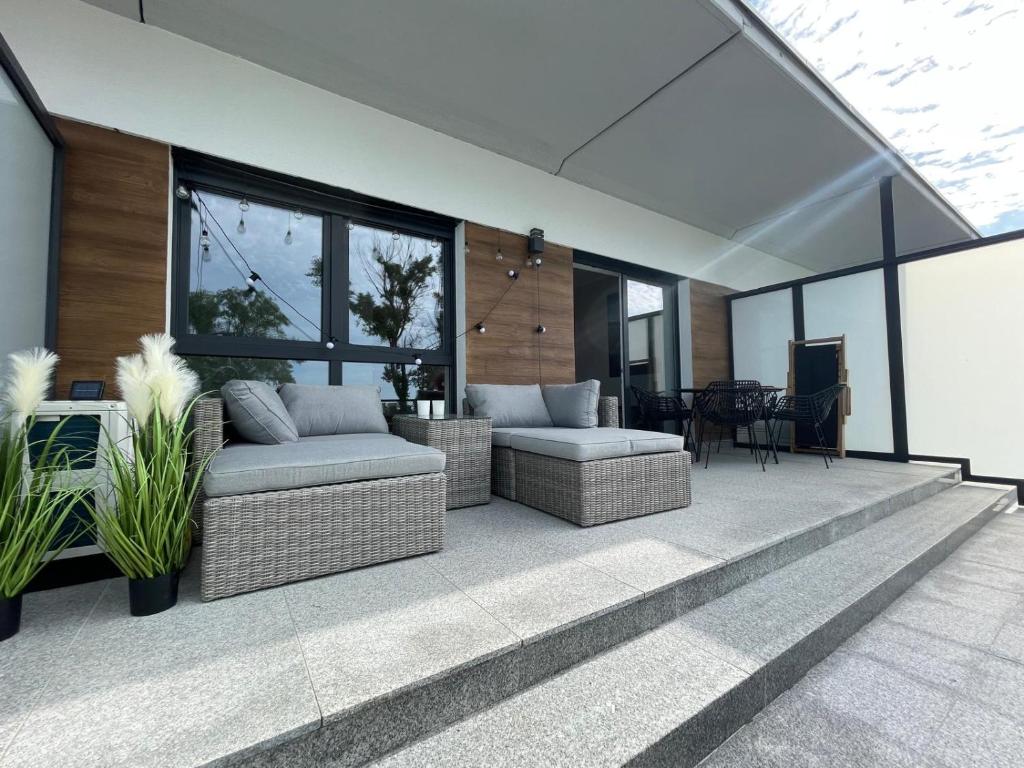 Khu vực ghế ngồi tại Blue Sky Apartment & SPA Dziwnów