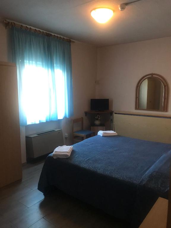 Postel nebo postele na pokoji v ubytování Odec Hotel