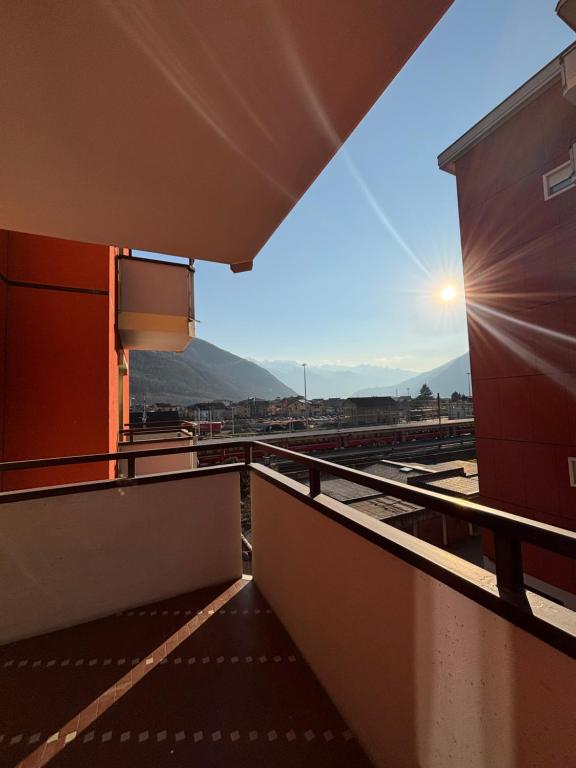 a view from the balcony of a train station at La finestra sul trenino in Tirano