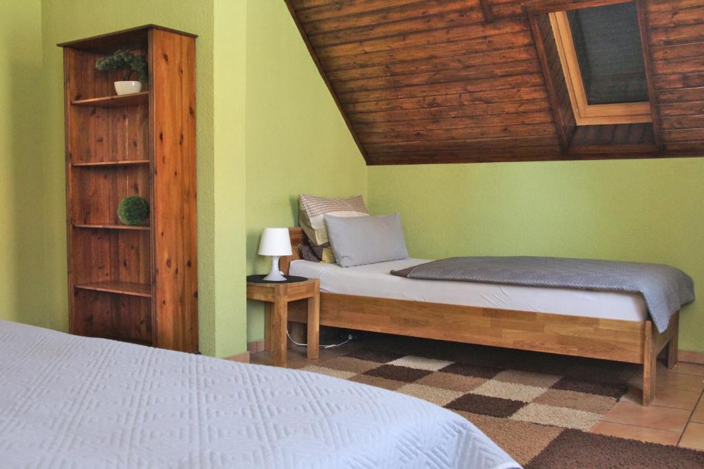 Postel nebo postele na pokoji v ubytování Ferienunterkünfte Familie Berger