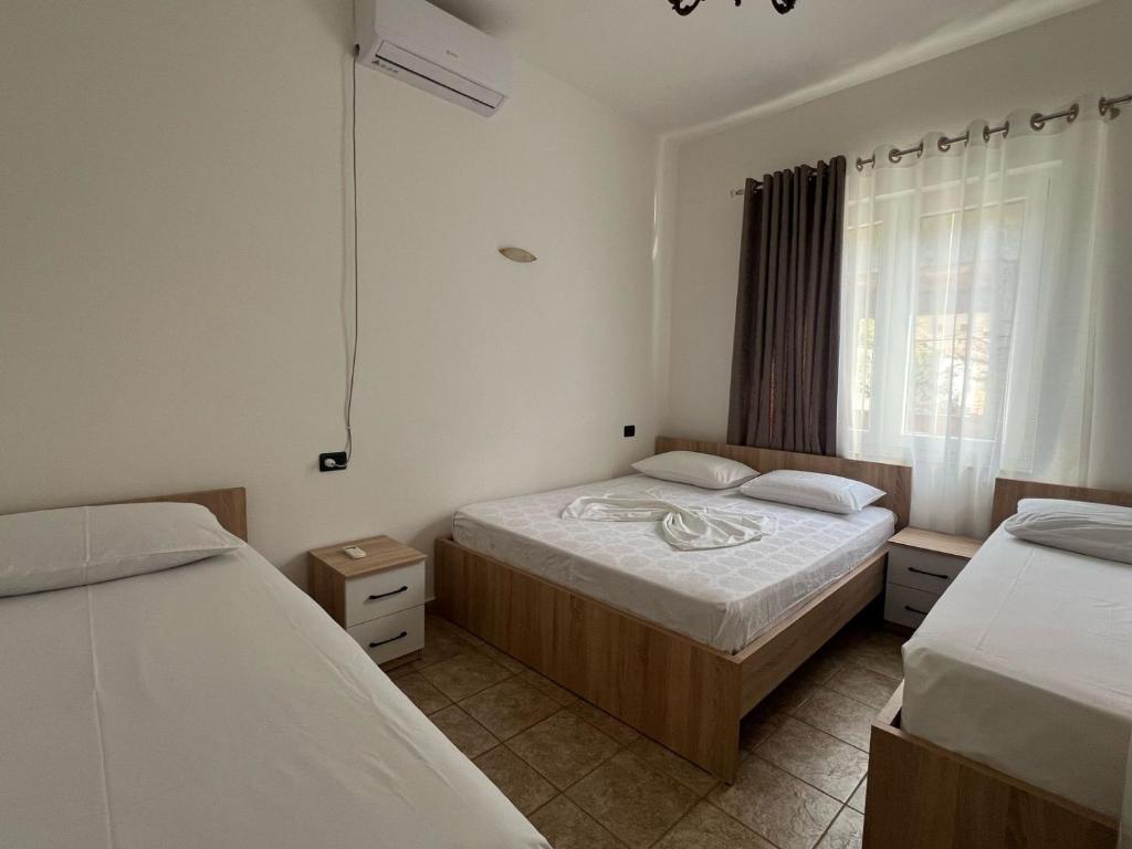 Postel nebo postele na pokoji v ubytování Seaside Family Apartament 2