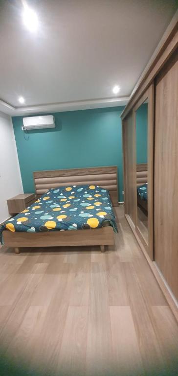Postel nebo postele na pokoji v ubytování DAR KHOUALDIA