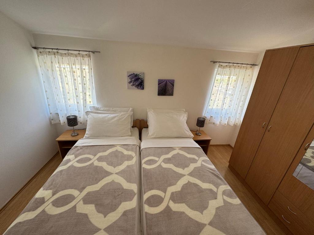 Postel nebo postele na pokoji v ubytování Apartment Pirun