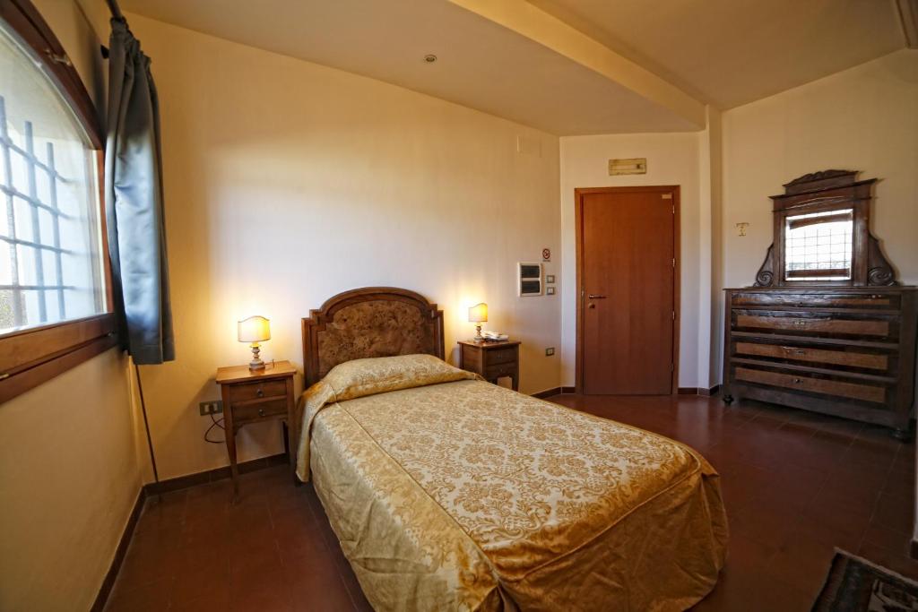 Łóżko lub łóżka w pokoju w obiekcie Hotel Luna