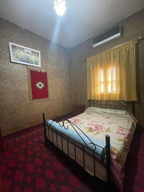 Postel nebo postele na pokoji v ubytování Auberge Gitelkst