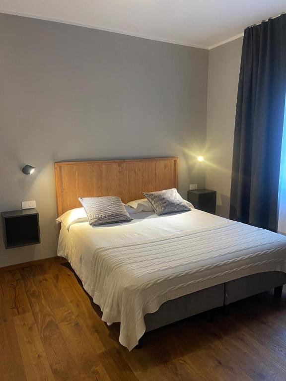Postel nebo postele na pokoji v ubytování Condhotel Fanti