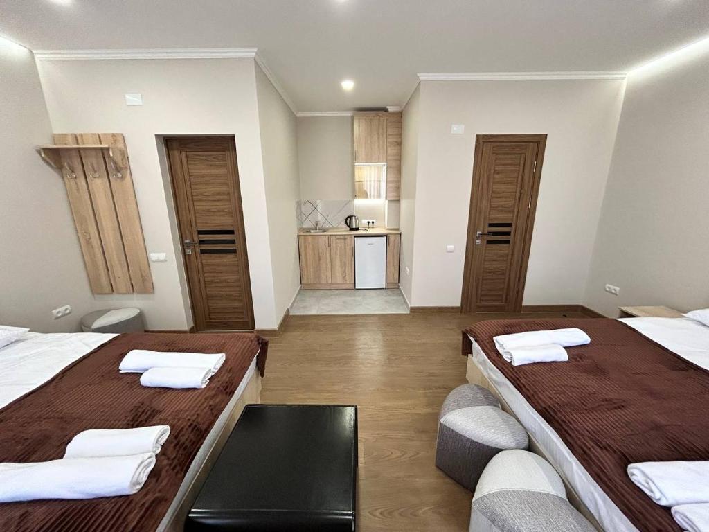 Postel nebo postele na pokoji v ubytování Guest House MARGARYAN