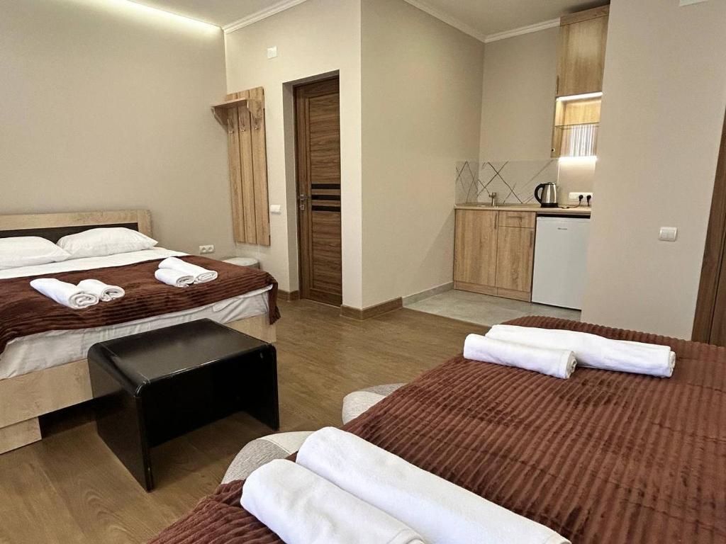 Postel nebo postele na pokoji v ubytování Guest House MARGARYAN
