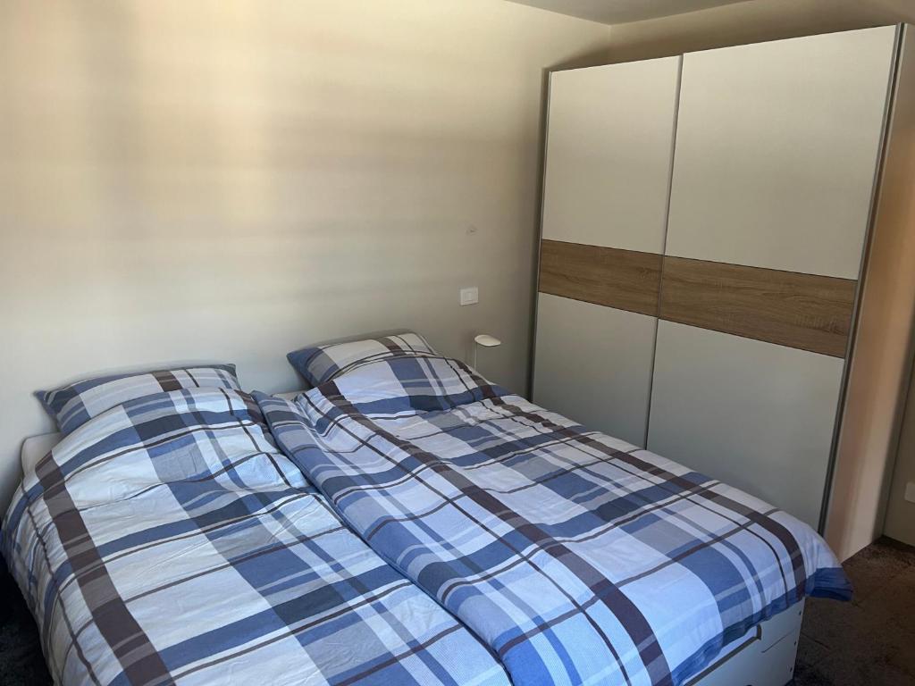 A bed or beds in a room at Ferienhaus-Chalet Breuil-Cervinia Valtournenche
