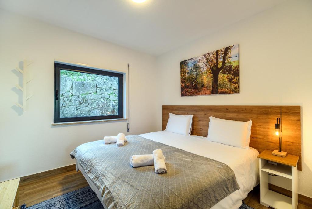 Postel nebo postele na pokoji v ubytování Casa do Beco - Seia, Serra da Estrela