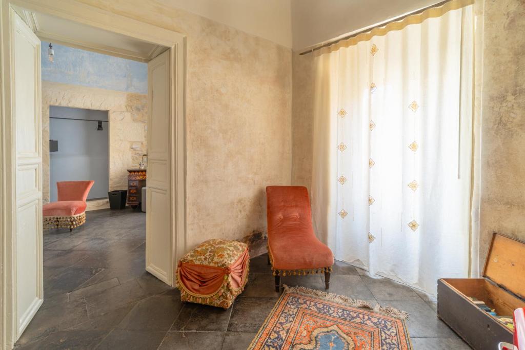 Posezení v ubytování P43 Sicilian Suites