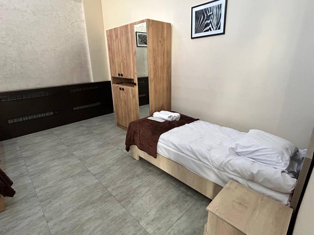 Postel nebo postele na pokoji v ubytování Guest House MARGARYAN
