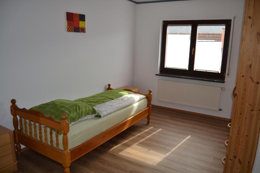 Postel nebo postele na pokoji v ubytování FeWo Ackermann