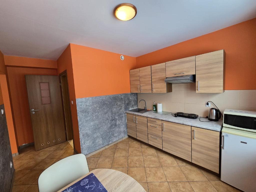 Kuchyňa alebo kuchynka v ubytovaní Apartamenty Pokoje DreamZone
