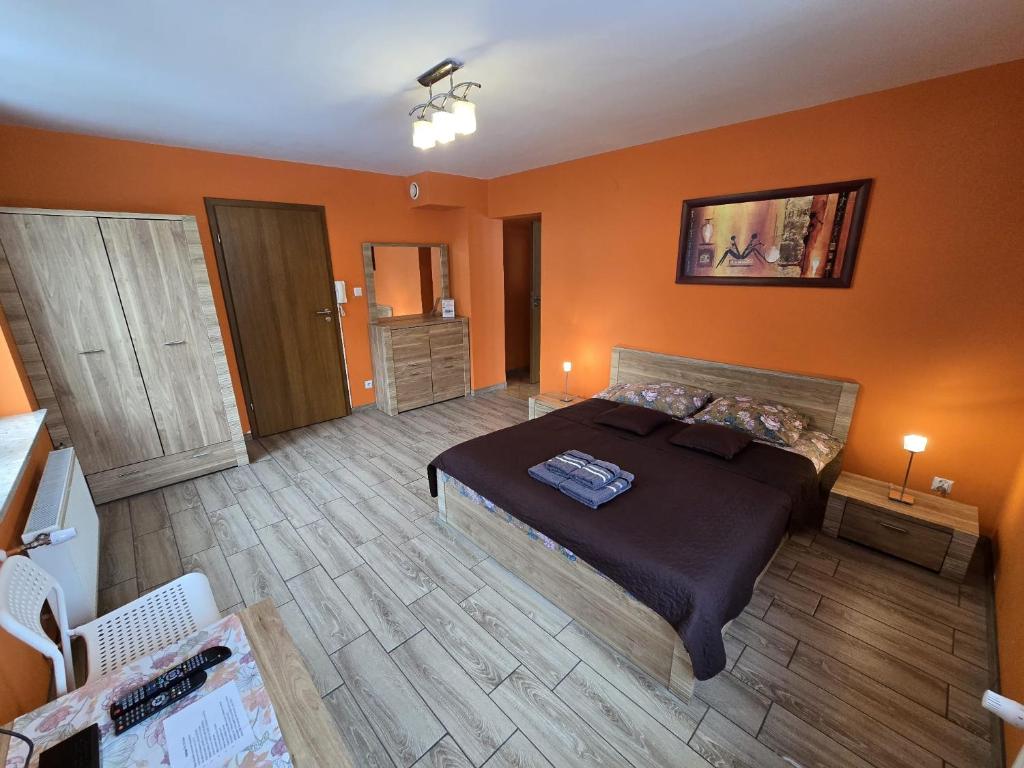 Posteľ alebo postele v izbe v ubytovaní Apartamenty Pokoje DreamZone