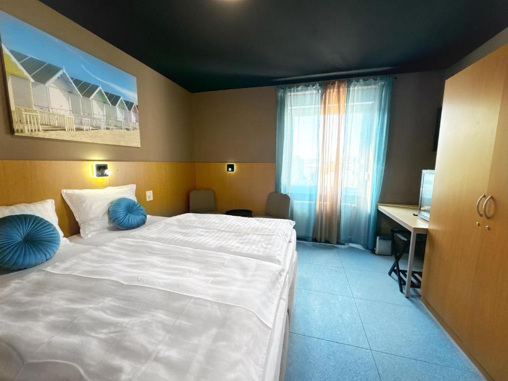 Postel nebo postele na pokoji v ubytování Premium B&B Nova Gorica