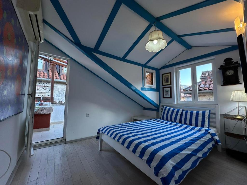 Postel nebo postele na pokoji v ubytování Charming apartment with a terrace