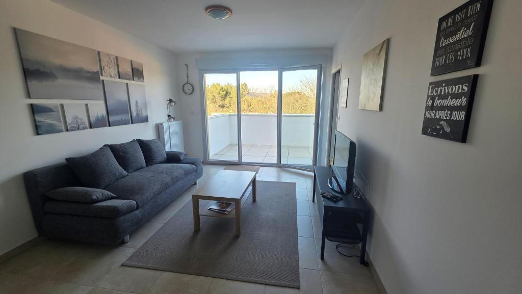 Χώρος καθιστικού στο L'Appartement Panorama des Pins