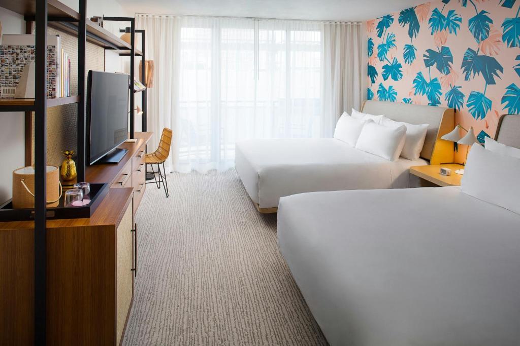 The Laylow Waikiki, Autograph Collectionにあるベッド